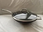 Calphalon Wok + Glass Lid Hard-anodized Nonstick 13 Flat Bottom Unison Sear 155 Used. Price: $94.95.