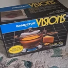 New Sealed 1984 Visions Cookware Rangetop 1.5-QT Covered Double Boiler V-20-N. Price: $85.00.