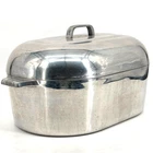Wagner Ware SIDNEY-0- Magnalite 4269 17 Qt. Roaster With Trivet Used. Price: $388.99.