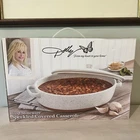 Dolly Parton 3.2 Qt Stoneware Speckled Covered Casserole Dish In Box. Price: $39.99.