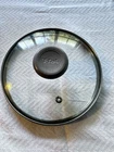 T-fal Glass Replacement 7.5 Inch Pot Lid 7.25 Inner Rim Vented Gray Knob Used. Price: $9.75.