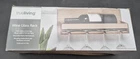 True Living Wine Rack 15" By 5.3" Holds One Bottle & 4 Stemmed Glasses Open. Price: $11.99.