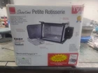 Ronco Showtime Petite Rotisserie Model ST2000WHGEN (white) New In Box Open. Price: $39.99.