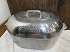 Imusa J38D Aluminum Cast Cajun Roasting Pan Dutch Oven Skillet 15IN With Lid Used. Price: $105.00.