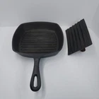 Tools Of The Trade Square Cast Iron Ribbed 10" Frying Pan And Press Used. Price: $19.99.