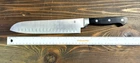 Razor Sharp Wolfgang Puck 9" Santoku Knife Full Tang 032008 Used. Price: $30.00.