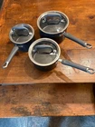 6 Pc Pampered Chef Titanium Hard Anodized 1.5 ,2 3QT, Saucepan & Pot Lid Used. Price: $65.25.