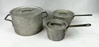 Vintage Leyse Toroware Aluminum Pots Saucepans 8 1/2, 3/4, Qts. W/ Lids Used. Price: $85.00.