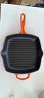 Crueset Signature Square Skillet In Flame - Lightly Used. Price: $100.00.