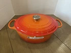 Le Creuset Signature Cast Iron Oval Dutch Oven Flame 33CM 8QT New Without Box. Price: $299.00.