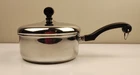 Farberware 1.5 Qt Saucepan & Lid Aluminum Clad Stainless Steel Vtg Dip On Bottom Used. Price: $12.00.