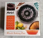 Nwt Parini Bundt Baking Pan 9X3 Non-stick Stoneware Orange. Price: $29.99.