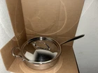 Williams Sonoma Stainless Steel Thermo-clad Saute Pan, 4 1/2-QT With Lid Used. Price: $249.99.