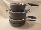 Calphalon Select Space-saving Hard-anodized Nonstick 7-PIECE Cookware Set Used. Price: $150.00.