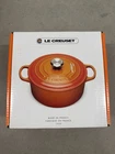 New Le Creuset Cast Iron 2.75 Quart Shallow Round Dutch Oven, Flame - Orange. Price: $220.00.