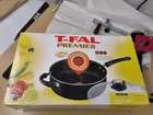 T-fal 12" Heavy Duty 5QT Deep Dish Aluminum Skillet With Lid New. Price: $39.99.