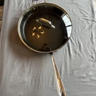 All-clad HA1 Hard Anodized Nonstick 12 In" Pan With Lid Used. Price: $39.99.