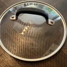 Simply Calphalon 7 Outer 6.5 Inner Glass Lid Slicone Handle New. Price: $18.94.