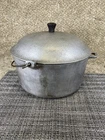 Household Institute Aluminum Dutch Oven 10 With Bail Handle & Lid Used. Price: $29.95.