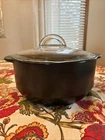 Pampered Chef Rockcrok Dutch Oven Black 4 Qt / 3.8 With Glass Lid Used. Price: $89.90.