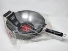 Joyce Chen Pro Chef Flat Bottom Wok Uncoated Carbon Steel, 14-INCH New. Price: $34.99.
