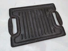 Cast Iron Enameled Reversible Grill/griddle. Emerilware. Used. Price: $12.02.