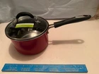 New Cuisinart Non Stick Aluminum (exterior) 2 Qt Covered Saucepan. Price: $30.00.