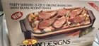 Retro Pyrex 2331-F Party Server 3QT Oblong Baking Dish Brass Accent Cradle W/box Used. Price: $12.00.