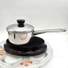 Tools Of The Trade Quart Sauce Pan HR10814 Stainless Steel W/lid Used. Price: $14.95.