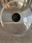 Creuset Pyrex 10 Inch Clear Glass Lid Black Knob Used. Price: $22.75.