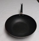 Joyce Chen Professional Series 12" Carbon Steel Excalibur Nonstick Stir Fry Pan Used. Price: $36.00.