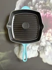 Creuset Lot Of 2 / Caribbean 10" Enameled Cast Iron Grill & Panini Press New. Price: $345.00.