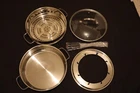 Nuwave Stainless Steel 5 Piece Fondue Set - Model 32003 Bl Never Used. Price: $40.00.