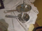 Wolfgang Puck Cafe Collection 12" Oval Skillet + Qt Sauce Pan Glass Lids Used. Price: $40.00.