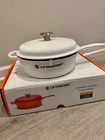 Creuset Signature Cassadou 3.75 Qt Enameled Cast Iron Excellent Condition New. Price: $238.00.