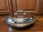 All Clad 10.5 Inch Petite Braiser Paella Stainless Steel W/lid Used. Price: $95.00.