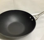 Calphalon Hard-anodized Dishwasher Safe Non Stick 10.5" Flat Bottom Wok Skillet Used. Price: $25.99.