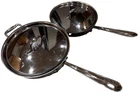 (2) All Clad Stainless Steel 3 Quart 11 & 10" Skillet Fry Pans With Lids Used. Price: $155.00.