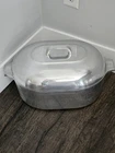 Wagner Ware Magnalite 4267-P Oval Aluminum Roaster With Lid & Trivet, Vintage Used. Price: $225.00.
