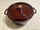 Staub Cast Iron 7 Qt, Round, Dutch Oven, Grenadine New. Price: $210.00.