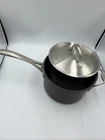 Calphalon 1/2-QT Hard Anodized Aluminum Stockpot #8704-1/2 With Lid Used. Price: $39.00.