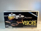 Nos Vintage 1984 Corning Visions Amber 5-PC Rangetop Cookware Set V-126 Open Box New. Price: $275.00.