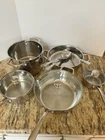 Wolfgang Puck Bistro Collection 5 Piece Stainless Steel Cookware Set With Lids Used. Price: $160.00.