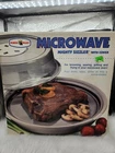 Nordic Ware Mighty Sizzler Microwave Browning Grilling Pan With Cover Open Box. Price: $26.99.