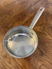 Wolfgang Puck Cafe Collection Saucepan Stainless Steel With Lid 042003 Used. Price: $14.99.