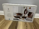 The Pioneer Woman Prairie Signature 14-PIECE Cast Aluminum Cookware Set, Brown New. Price: $139.97.