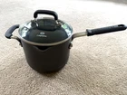 Calphalon 1/2 Qt. Hard-anodized Aluminum Saucepan With Glass Lid. 8704-2 Used. Price: $24.99.