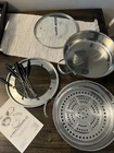 Nuwave Stainless Steel Ultimate Cookware Set Steamer Fondue, Model 32003A Used. Price: $18.00.