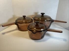Set 3 Vtg Visions Corningware Pyrex Amber Glass Cookware Pots Lids 6 Usa Used. Price: $99.88.