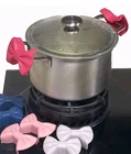 New Cooking Pot Silicone Handle Holders Set Of 2WHITE Bows Pantry York City. Price: $12.00.